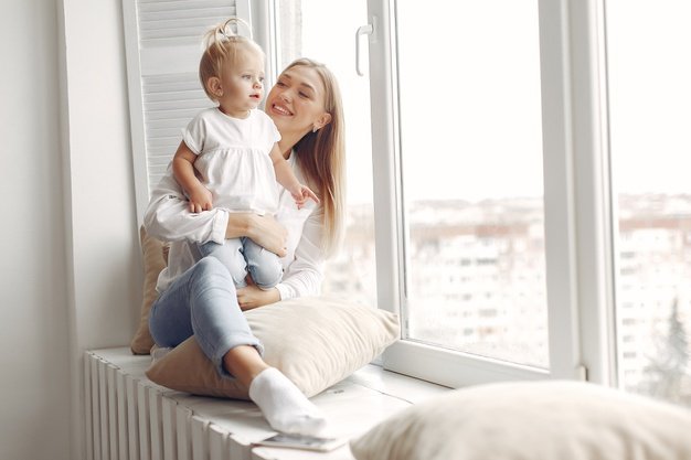 Woman Holds Child Her Arms Hugs Her Mother White Shirt Is Playing With Her Daughter Family Has Fun Weekends 1157 40725