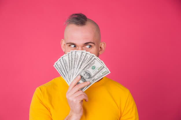 European-man-with-fan-on-100-dollars